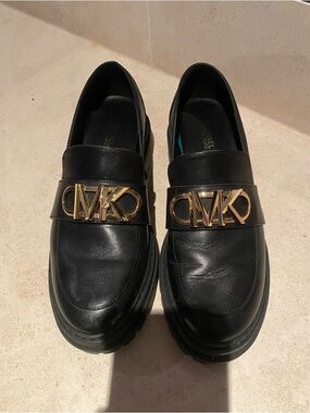 Women’s Michael Kors Black Leather Loafers with Gold MK Emblem